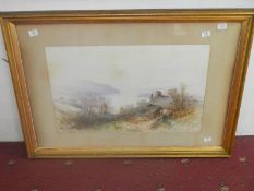 A large F/G watercolour of a cottage in a harbour landscape, signature indistinct