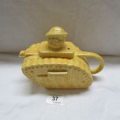 A yellow tank teapot by Sadler