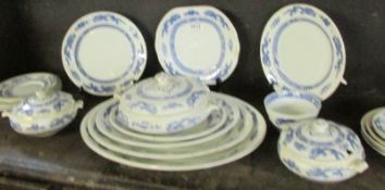 24 pieces of blue and white dinnerware