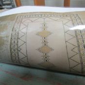 A beige rug, 200 x 120cm