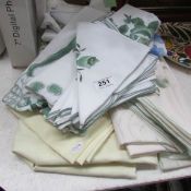 A quantity of linen tablecloths etc