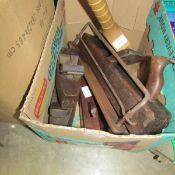 A quantity of old tools including wood planes (one marked W Gration) and a spoke plane