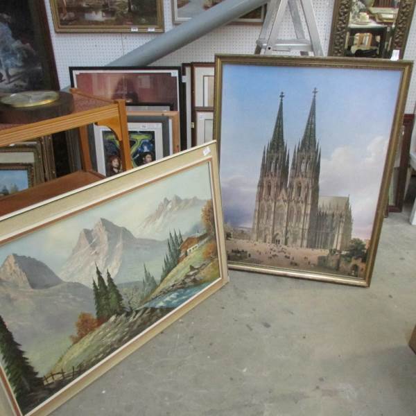 A large oil alpine scene and a print of Lincoln Cathedral