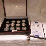 A cased set of 12 Silver HM Queen Elizabeth, The Queen Mother, commemorative coins with
