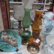 2 coloured glass oil lamps and one other