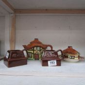 A Burlington cottage teapot and butterdish together with 2 brown Cadbury chocolate mugs