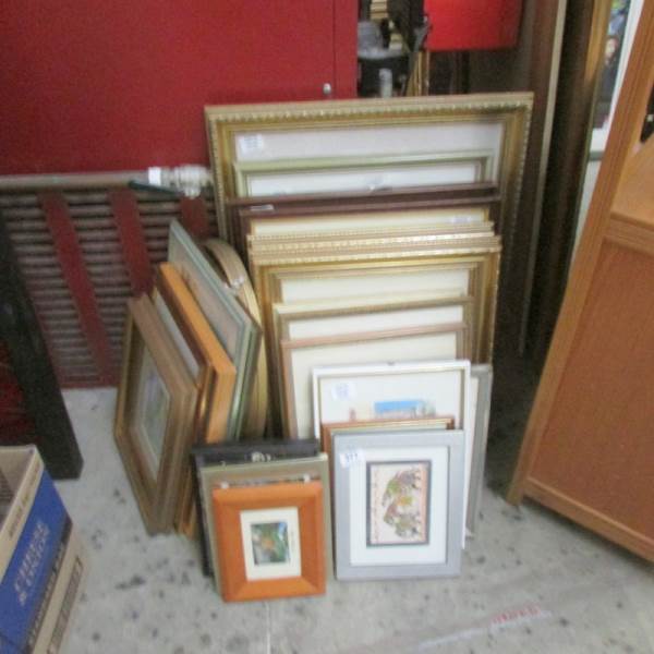 A large quantity of framed and glazed prints