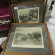 A pair of framed and glazed signed engravings