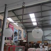 A copper double ceiling light with Art Deco glass shades