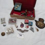 A mixed lot including badges, buttons etc