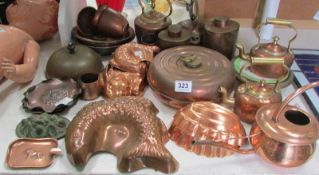 A large quantity of copperware including jelly moulds