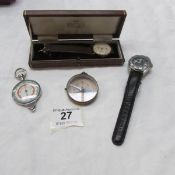 A Smith's wrist watch, one other, a compass and a map route measure