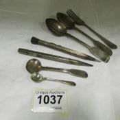 2 silver propelling pencils, a silver fork, 2 silver teaspoons, a silver mustard spoon and silver