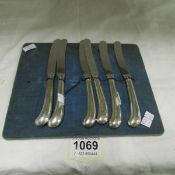 6 silver handled butter knives