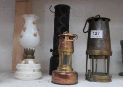 2 old miner's lamps and 2 others
