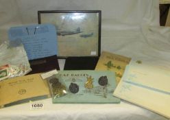 A mixed lot including cap badges, RAF cigarette cards, USA message books etc