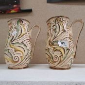 A pair of Wade 'Gothic' tulip jugs