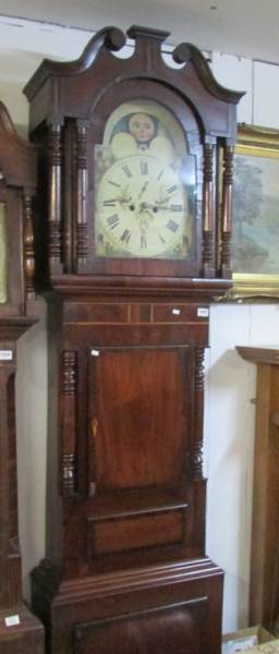 An 8 day mahogany long case clock with painted moon dial