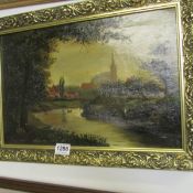 An oil on canvas 'River with Church in distance' signed E Perrin