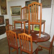 A good quality extending dining table and 6 chairs