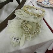 A quantity of old bridal headresses and gloves