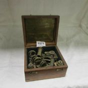 A cased brass sextant