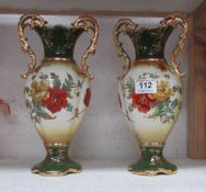 A pair of Staffordshire vases