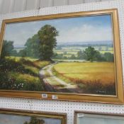An oil on canvas country scene signed W Haslam
