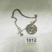 A silver fob watch on silver Albert chain