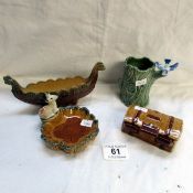 4 items of Wade being a treasure chest, a viking ship, a bird on stump and a deer pin dish