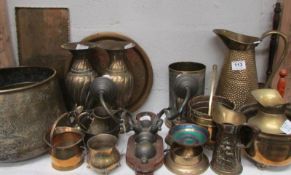 A mixed lot of brassware including large old pot, bell, candlesticks, jug etc