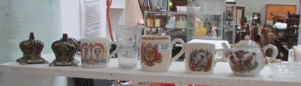 A mixed lot of commemorative items including money boxes