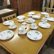 A quantity of shamrock decorated tea ware including Aynsley and Carrigaline