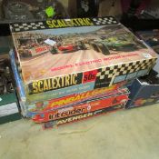 A vintage Scalextric set in original box with replacement cars, an A Team pinball and 2 others