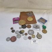 A mixed lot of various coins and medals