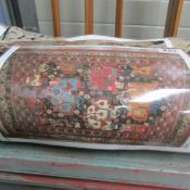 A Turkish rug, 170 x 106cm