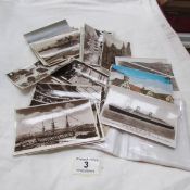 A quantity of old postcards including maritime