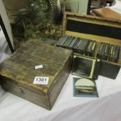 146 glass slides in 2 wooden boxes