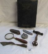 A mixed lot including Motorist's first aid kit, corkscrew, pocket watch etc