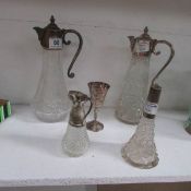 2 claret jugs with plated tops, A small jug, silver topped perfume bottle and a goblet