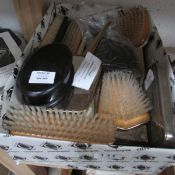 A box of brushes etc