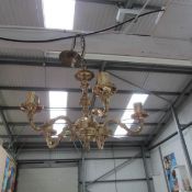 A 5 lamp brass ceiling light
