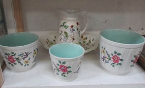 A jug and basin set and 3 planters