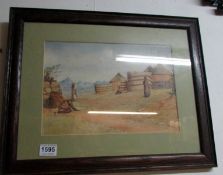 A framed and glazed African village scene watercolour signed F H Dutton