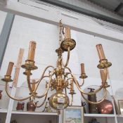 A brass 9 lamp ceiling light