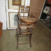 An old wooden metamorphic high chair