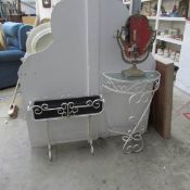 A wrought iron plant stand, hall table and a vanity mirror