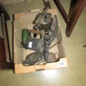 A box of brass blow lamps, oil cans etc
