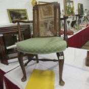 A small cane backed carver chair