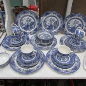 A mixed lot of china including Old Willow, Ironstone etc, some a/f